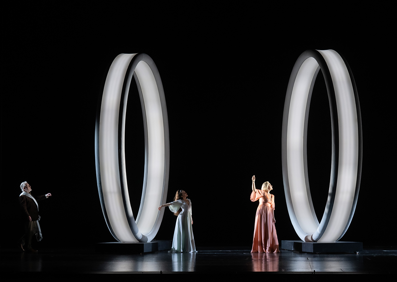 Two light circles with two female singers